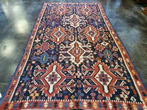 jewel tone colored kilim rug